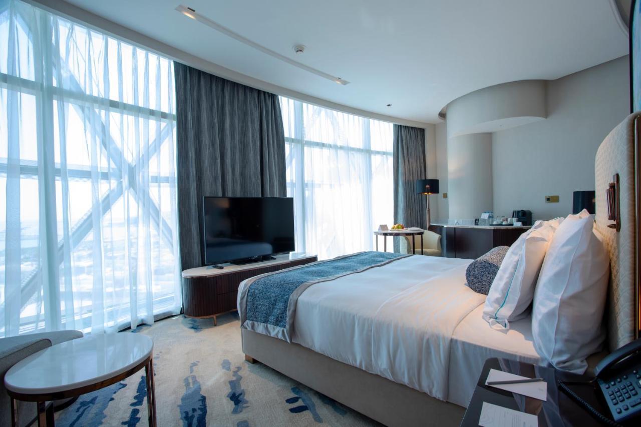 Century Marina Hotel - Lusail Экстерьер фото A bedroom at the hotel