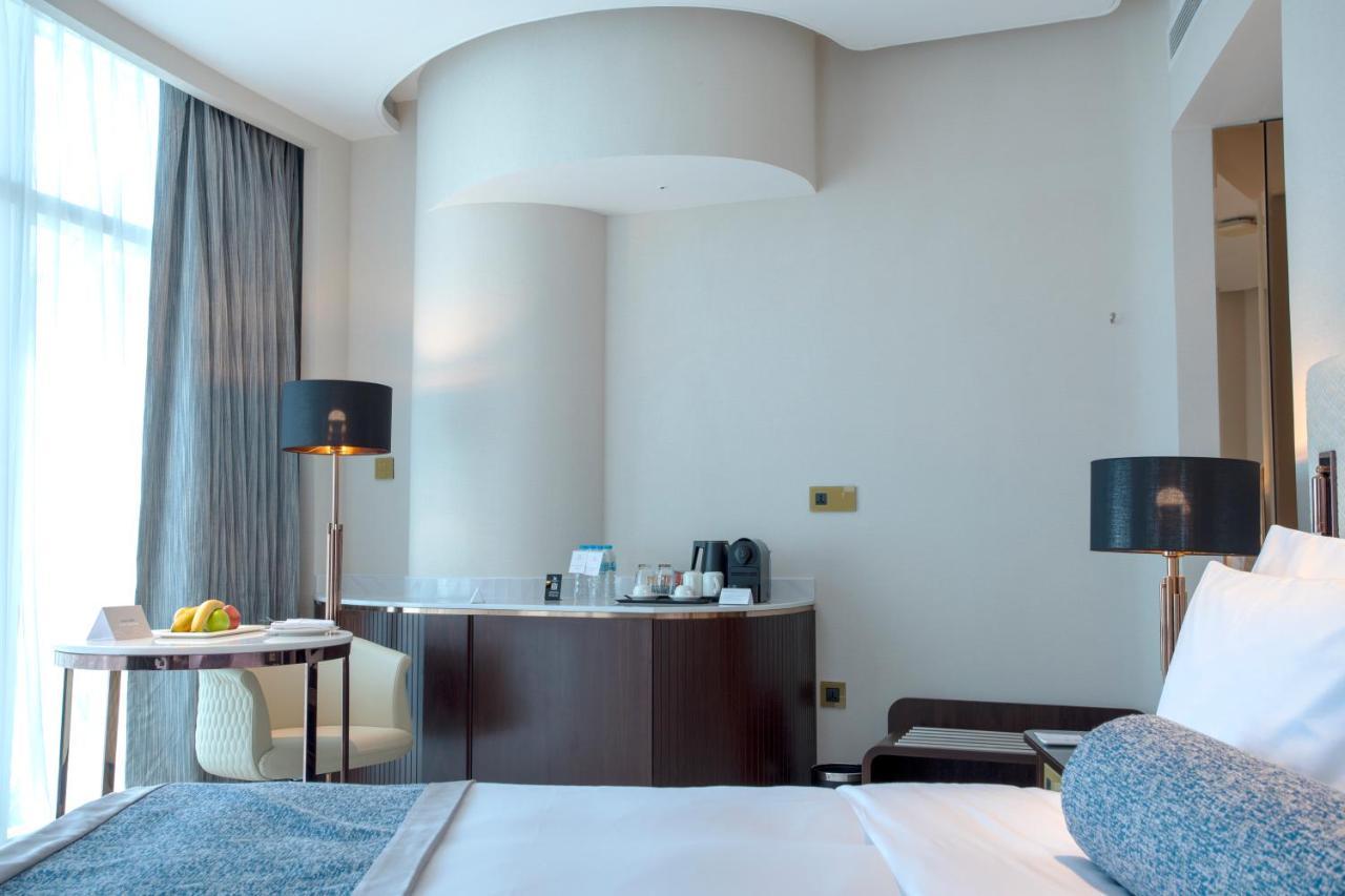 Century Marina Hotel - Lusail Экстерьер фото A room at the hotel