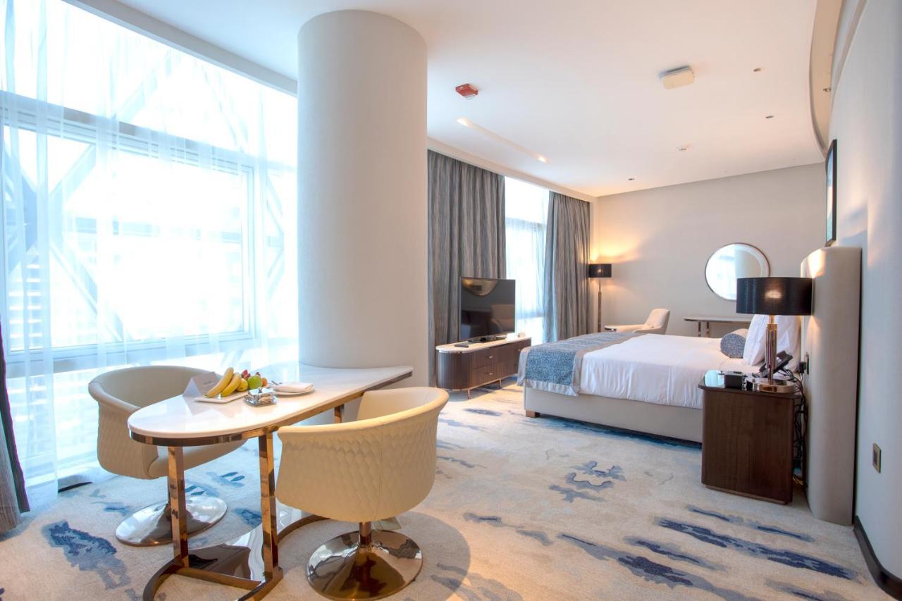 Century Marina Hotel - Lusail Экстерьер фото A suite at the hotel