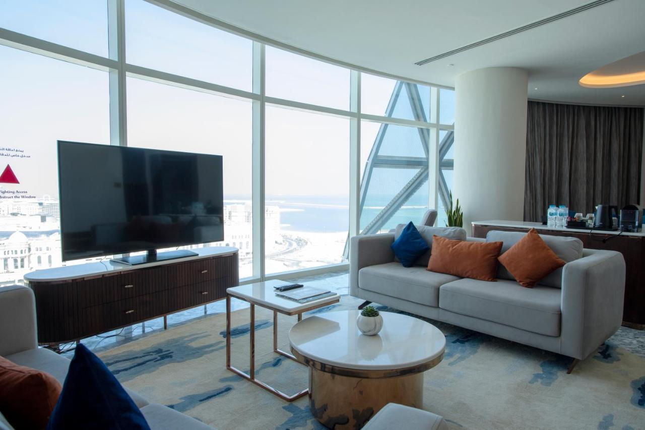 Century Marina Hotel - Lusail Экстерьер фото A living room in a suite at the hotel